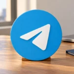 Логотип Telegram рядом с папкой для сохранённых данных